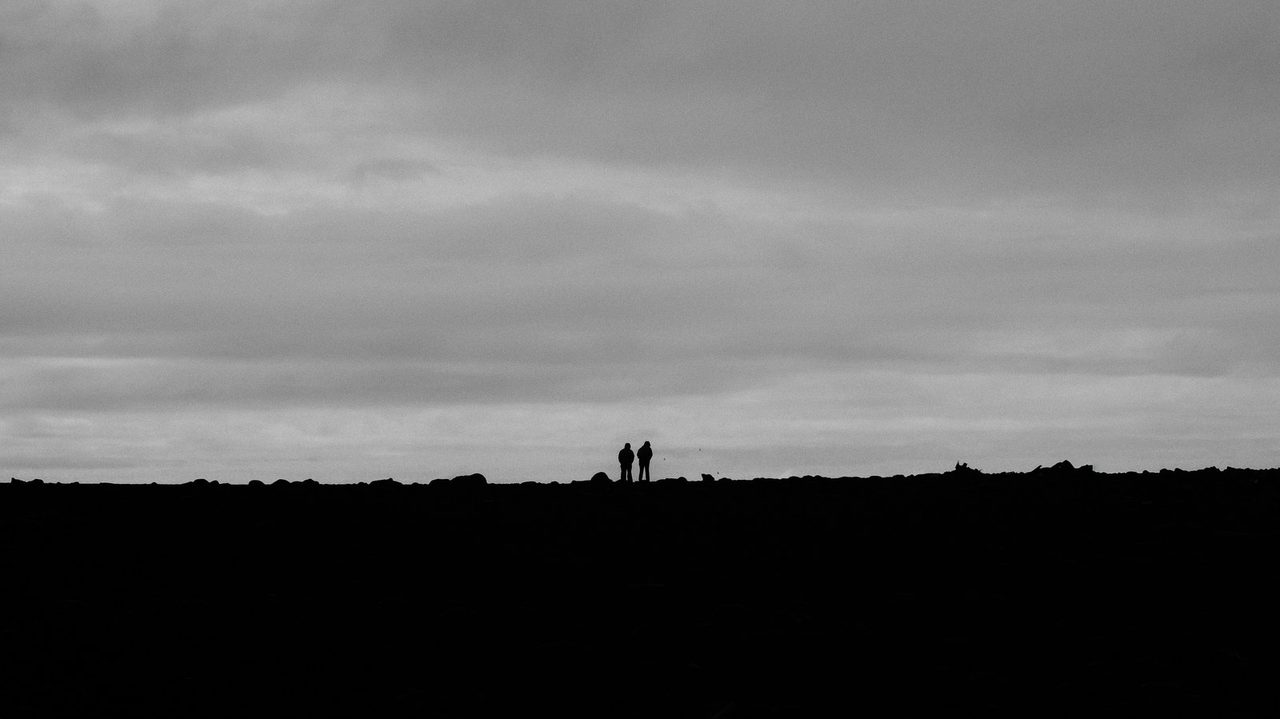 Silhouettes on the lava horizon